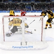GANGNEUNG, SOUTH KOREA - FEBRUARY 25: Vyacheslav Voinov #26 of the Olympic Athletes from Russia scores a first period goal against Germany's Danny Aus den Birken #33 while Yasin Ehliz #42 looks on during gold medal game action at the PyeongChang 2018 Olympic Winter Games. (Photo by Andre Ringuette/HHOF-IIHF Images)

